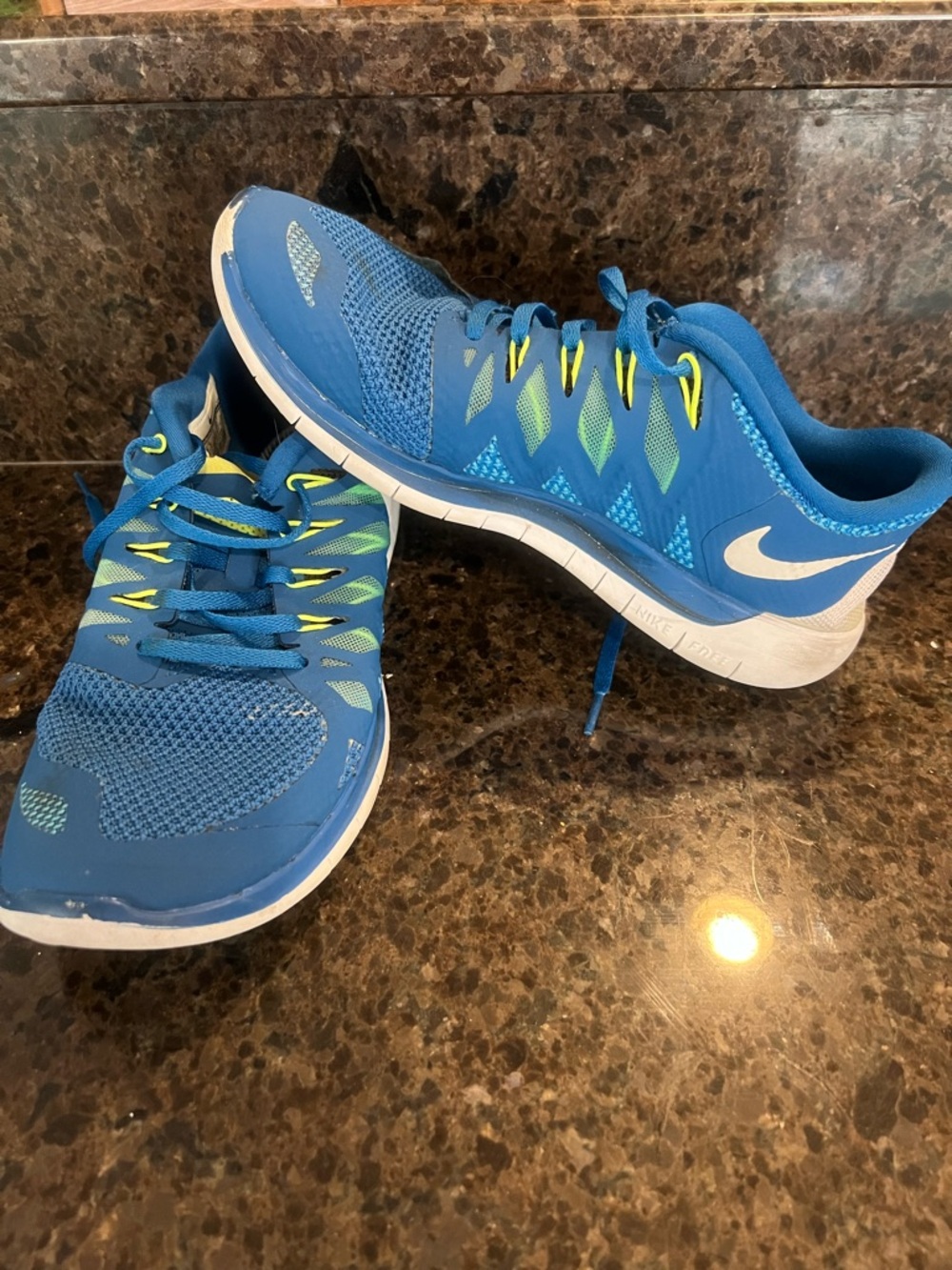 Nike Blue Athletic Sneakers with Neon Yellow Accents
